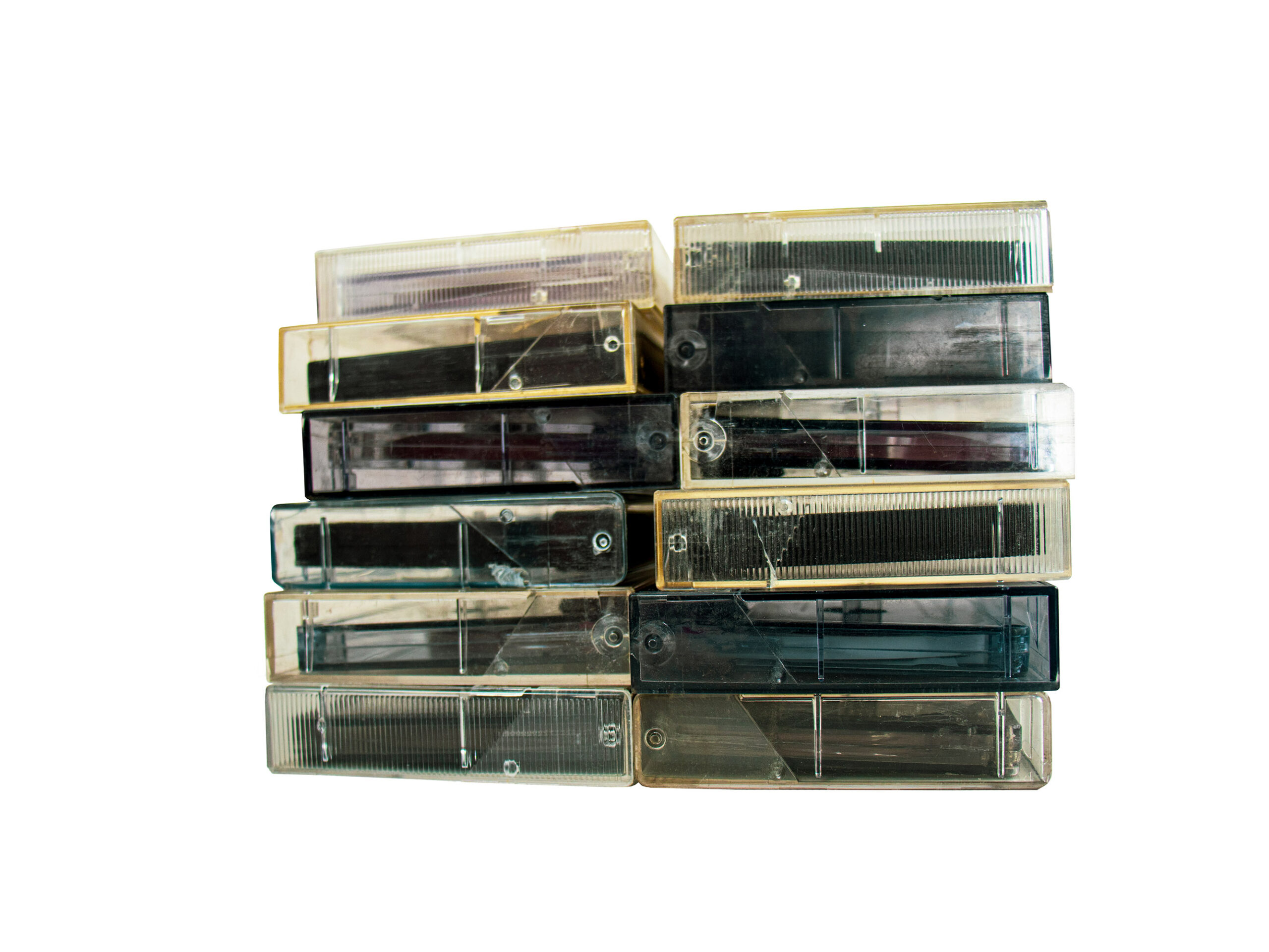 stack-of-old-audio-cassettes-on-white-background-r-2023-11-27-05-03-15-utc